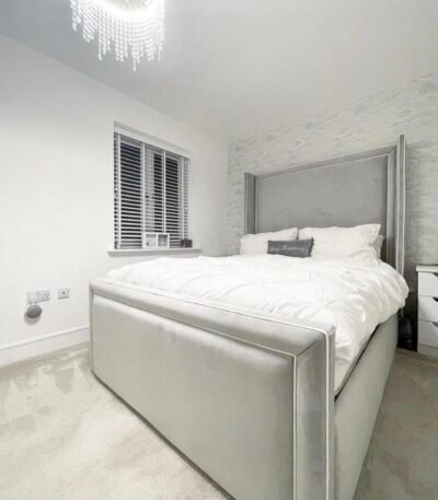 Winged Headboard Ottoman Bed